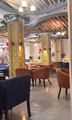 City Food Court lounge area with modern decor and warm lighting